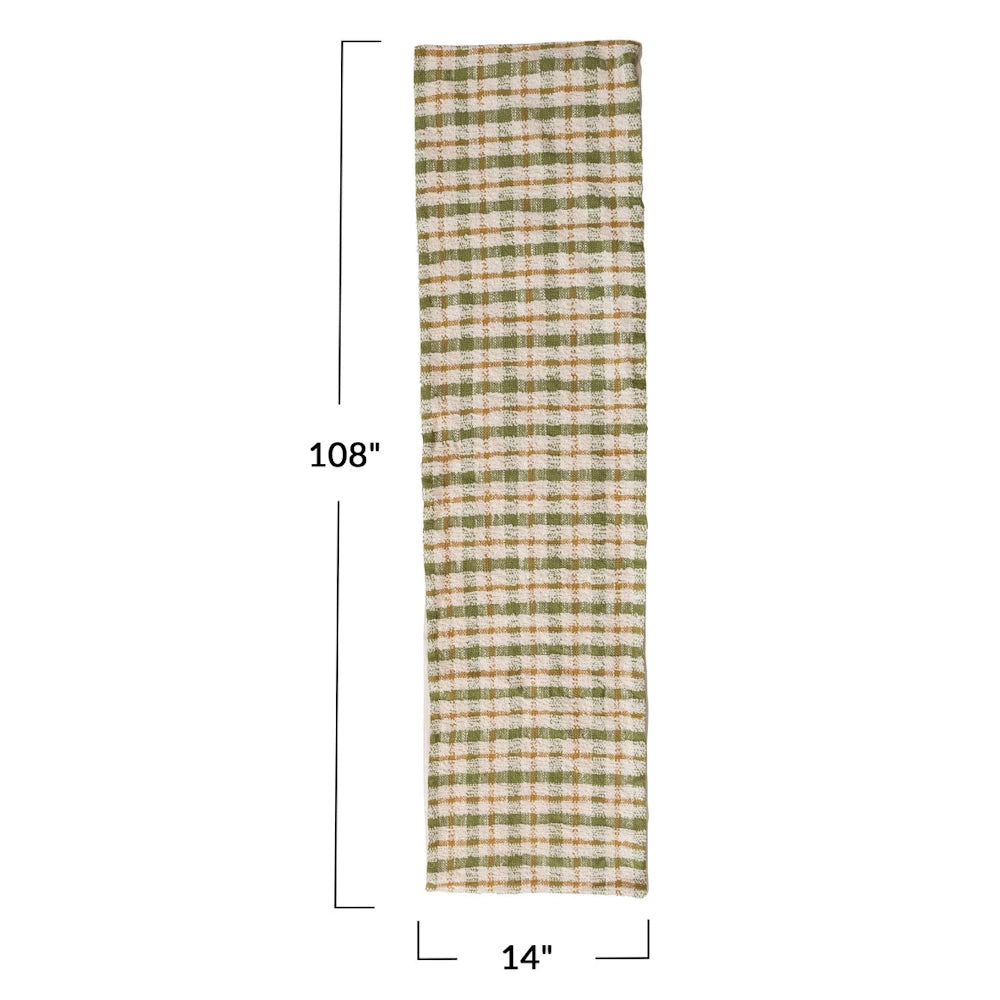 Green and beige plaid table runner with dimensions showing 108 inches long by 14 inches wide.