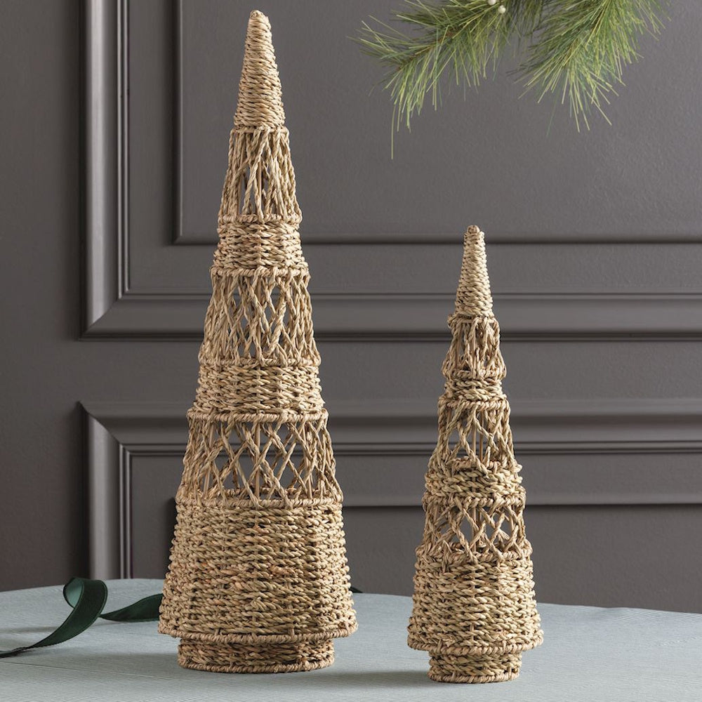 Two woven straw cone-shaped Christmas tree decorations in different sizes.