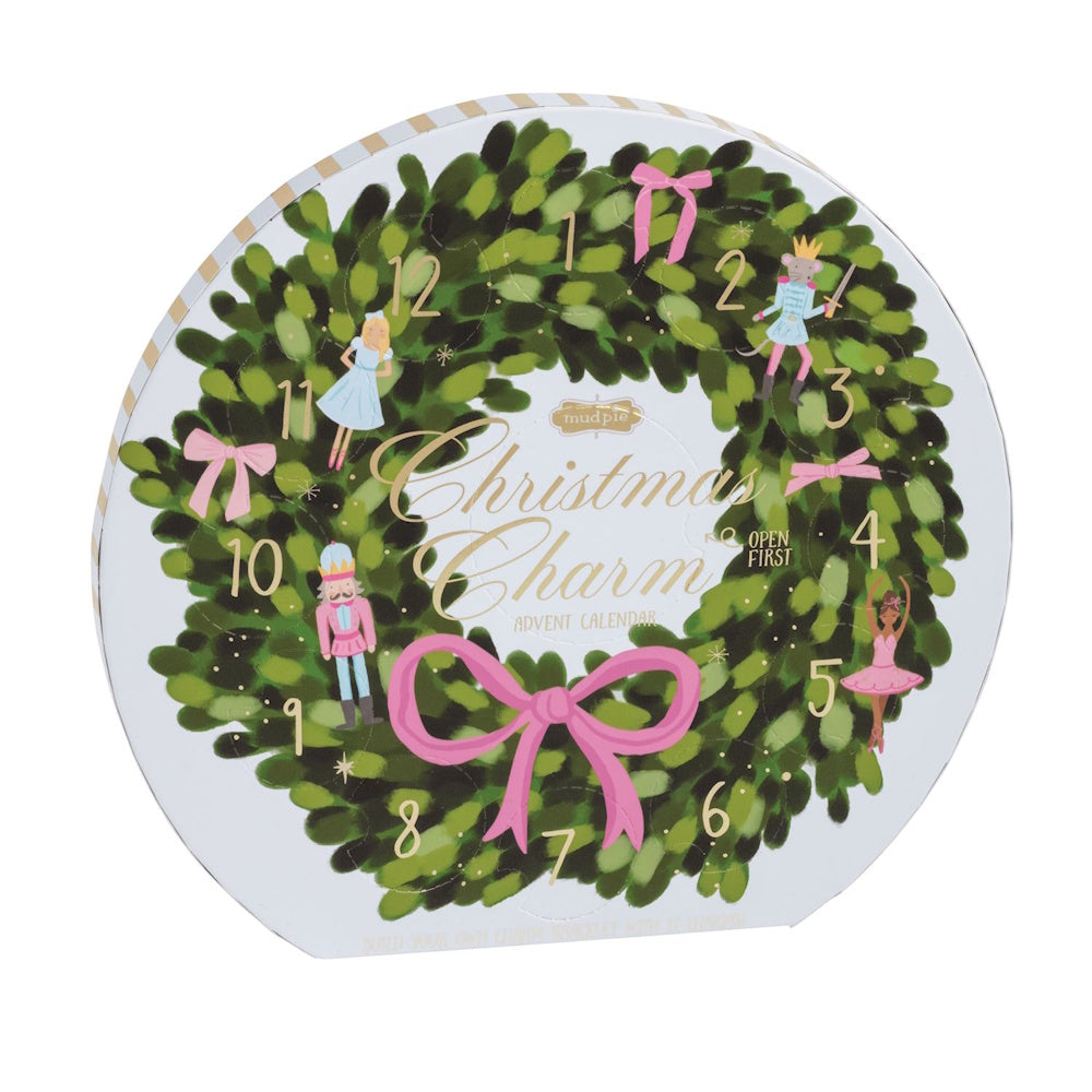 Round Christmas Charm Advent calendar shaped like a green wreath with pink bows and Nutcracker figures.