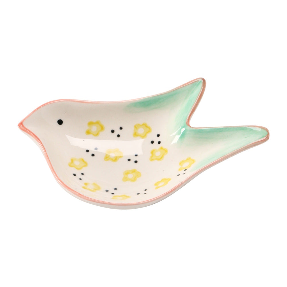 A hand-painted, bird-shaped stoneware dish with small yellow flowers and light green accent paint.
