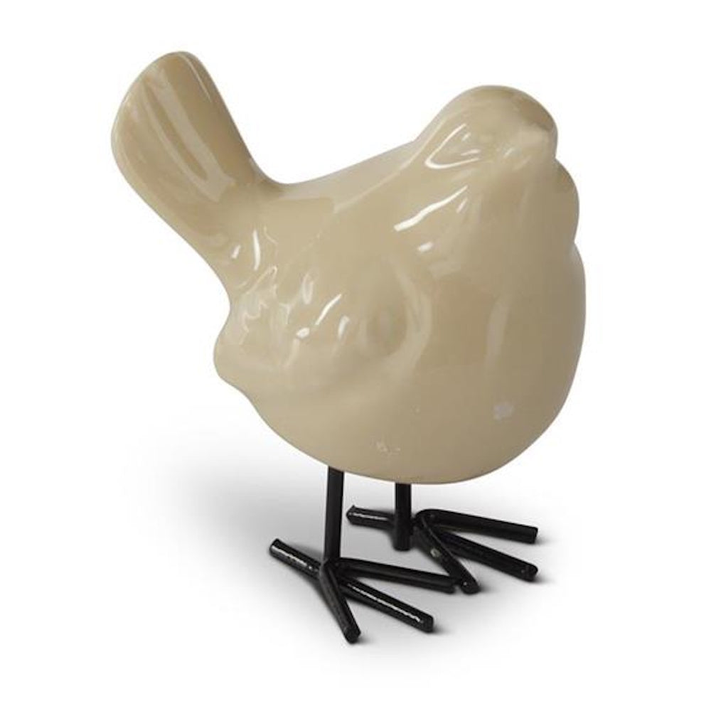 Glossy cream-colored ceramic bird decor with black metal legs, shown from a front-side perspective on a white background.