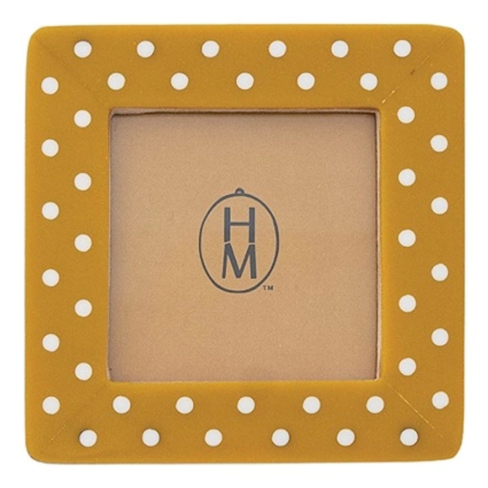 Square mustard yellow mini picture frame featuring a white polka dot pattern.