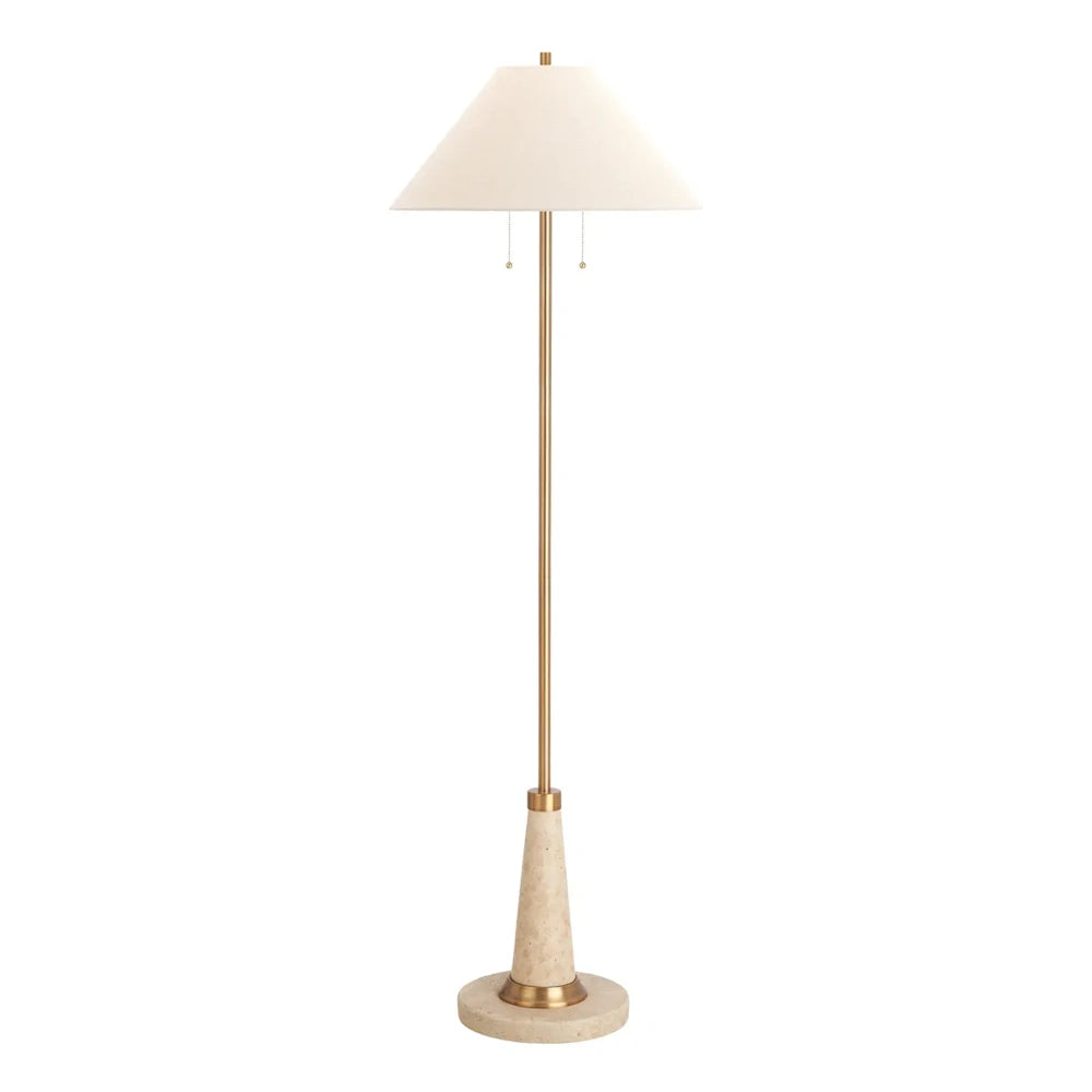 Modern brass floor lamp featuring a tapered stone base and a white conical fabric shade.